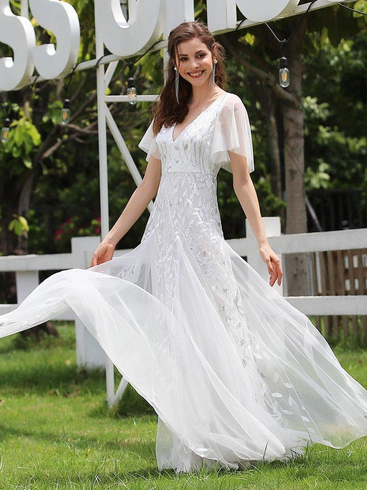 Adèle|Robe de Soirée Longue Romantique et Scintillante à Col V et Pailletes